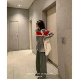 Advbridge Mermaid American wear Color clashing striped knit sweater for women Early fall Loose new top Lazy style Fashionable and unique.
